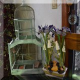 D45. Birdcage and faux flowers.